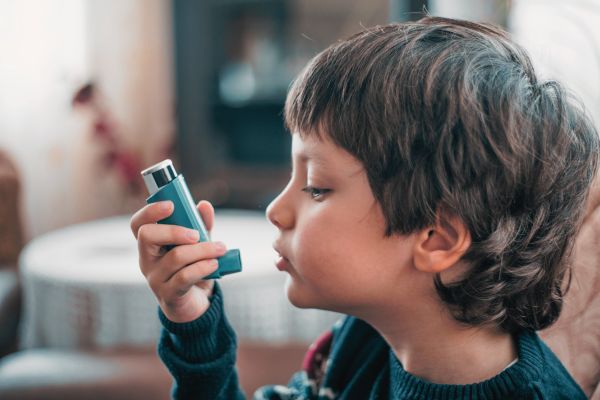 Child with an inhaler