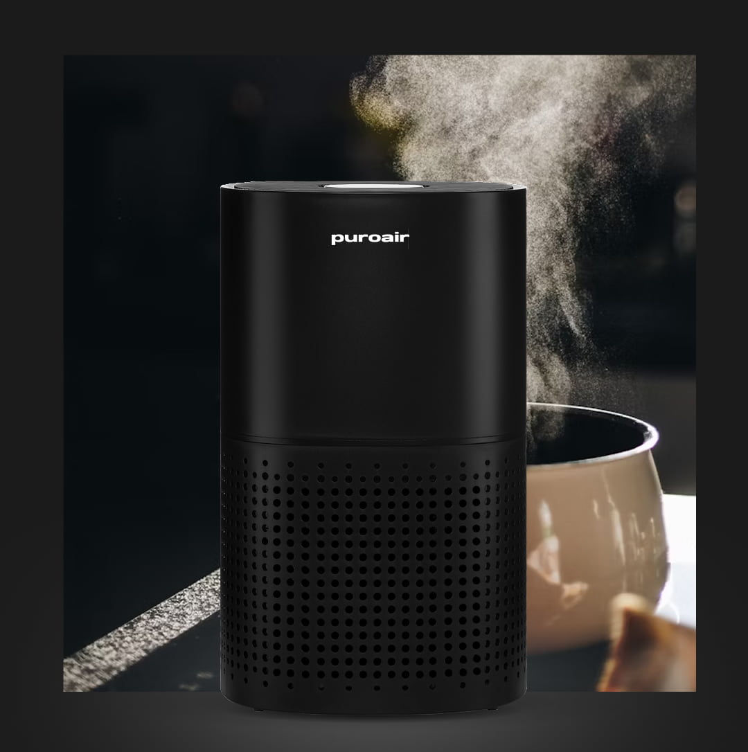 PuroAir air purifier with coffee mug and steam in background