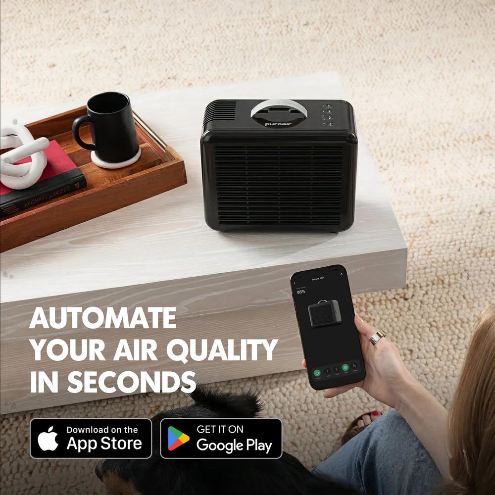 PuroAir 100i air purifier on table with smartphone app interface