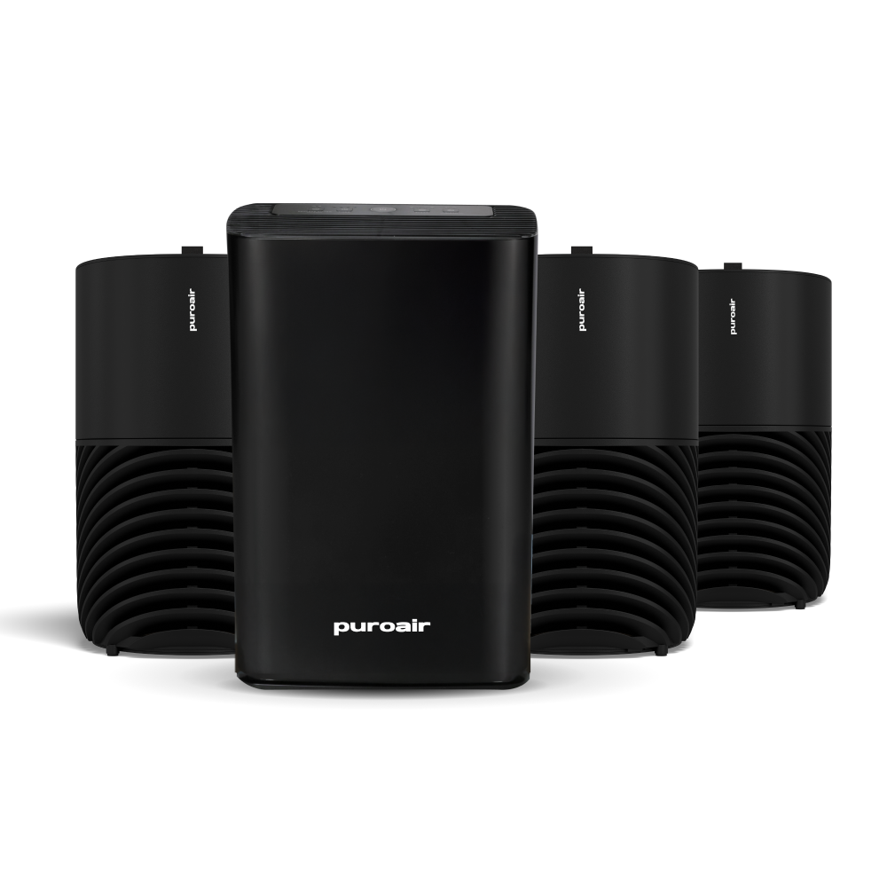 Three PuroAir 130i air purifiers and one 400 air purifier on white background