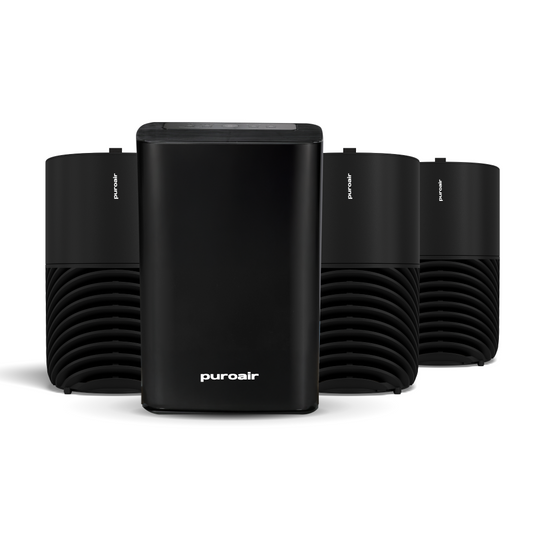 Three PuroAir 130i air purifiers and one 400 air purifier on white background