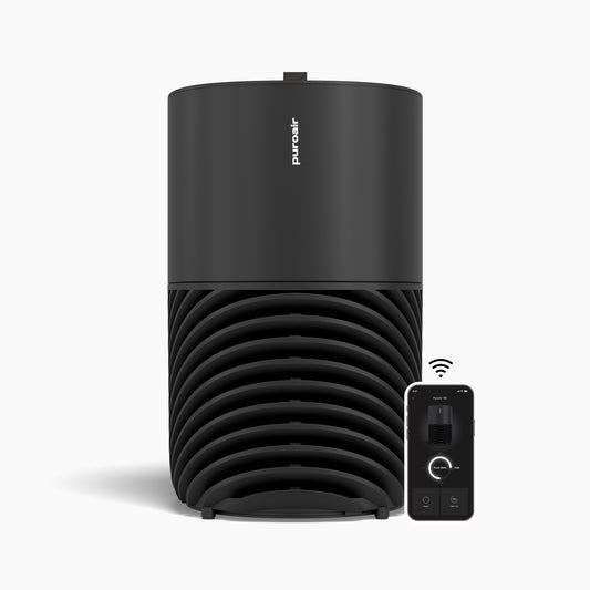 PuroAir 130i smart air purifier with mobile phone displaying app interface