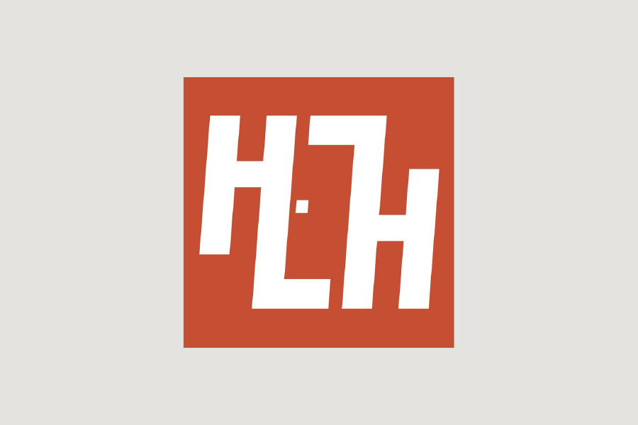 Home Living Handbook Logo orange on white background