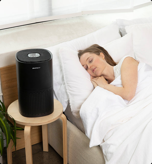 puroair 240 air purifier on nightstand by person sleeping