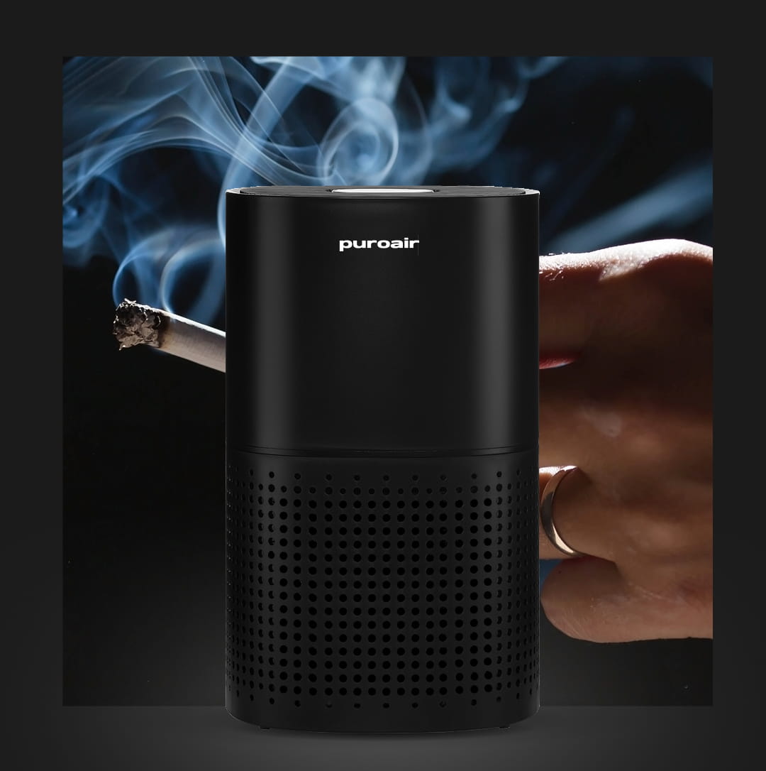 PuroAir 240 air purifier with hand holding lit cigarette and smoke